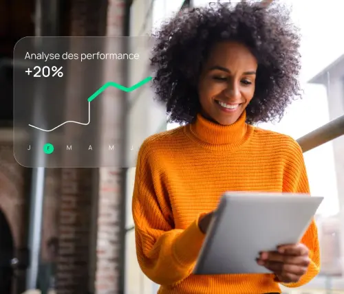 Une gérante suit les performances de ses campagnes sur sa tablette